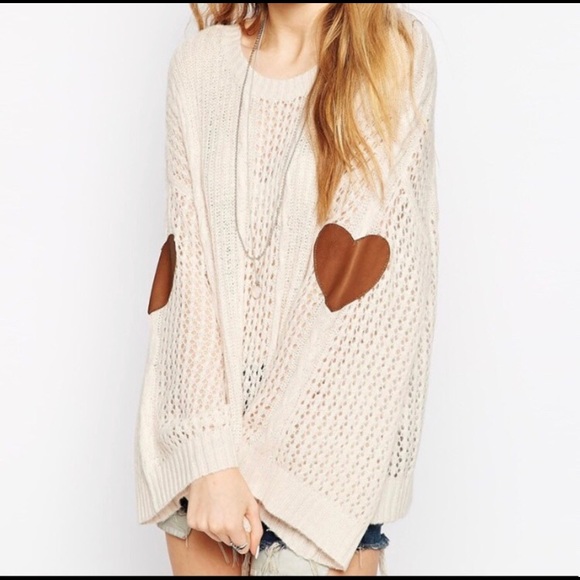 white sweater with heart elbow patches